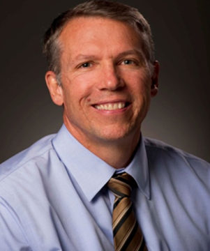 Dr. Gregg A. Okesson